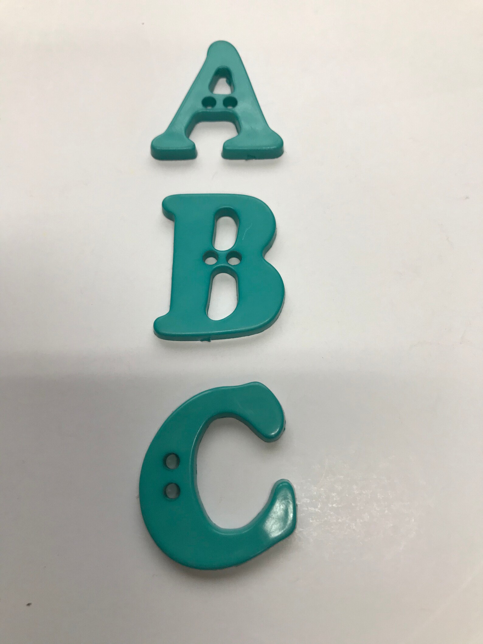 ABC Green Buttons . Set of the Letters ABC Buttons . 1 1/8