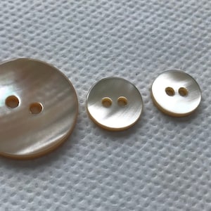 Natural Beige Mop Shell Buttons. 2 hole  Real Shell  3 sizes  New vintage 7/8&quot; - 1/2&quot; and 7/16&quot;  Lot size 6 buttons