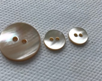 Natural Beige Mop Shell Buttons. 2 hole  Real Shell  3 sizes  New vintage 7/8" - 1/2" and 7/16"  Lot size 6 buttons