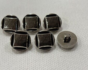 Round Square center chromed buttons with satin center.  Shank Buttons - .Size is:3/4"  Lot size is 6 buttons.
