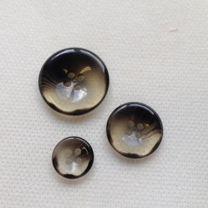 Black / smoke buttons, Three sizes available 7/8"3/4" 1/2" (pick size). Lot size is 6 buttons, Beautiful Black and clear buttons.