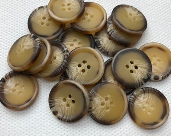 Satijn donkerbruine rand met 4-gaats knopen gemêleerd camelkleurig midden.  Grote knoop 15/16" veel van 6 knopen.