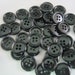 see more listings in the Black Buttons  section