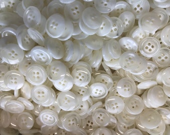 White  buttons 4 hole 5/8" (15mm) in diameter round Back ( Lot of 10 buttons).  There are 10 different colors in seperate listings.