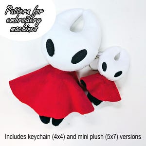 May include: Two plush figures: a large and small white character with black eyes and a red cape. The text "Pattern for embroidery machines" is in a white circle. The text "Includes keychain (4x4) and mini plush (5x7) versions" is below.
