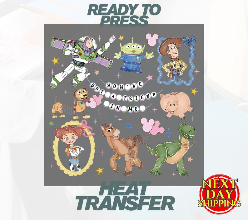 May include: A heat transfer sheet featuring Toy Story characters including Buzz Lightyear, an alien, Woody, Slinky Dog, Hamm, Jessie, Bullseye, and Rex. The text reads READY TO PRESS, YOU'VE GOT A FRIEND IN ME, and HEAT TRANSFER.