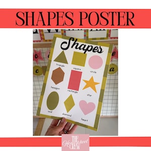 May include: A rectangular educational poster titled Shapes in black script, featuring nine colorful geometric shapes: a green triangle, yellow square, pink circle, brown hexagon, red rectangle, yellow star, green oval, yellow diamond, and pink heart.
