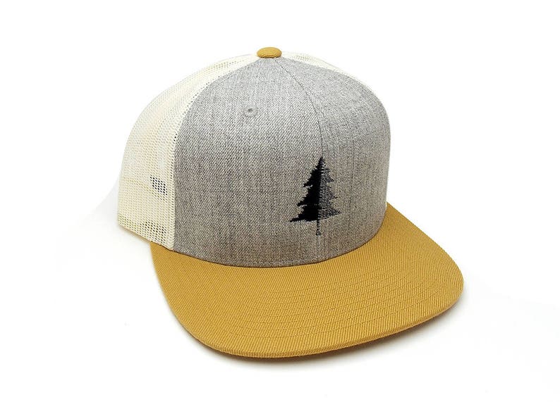 May include: A gray and beige trucker hat with a black embroidered pine tree design.