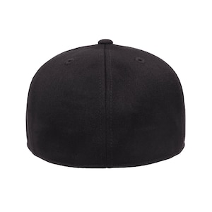 May include: A black baseball cap with a flat brim and a structured crown.