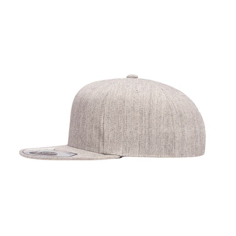 May include: A gray heather flat brimmed baseball cap with a curved brim.