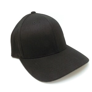 Close up of embroidered trout and forest design on Flexfit 210 fitted hat