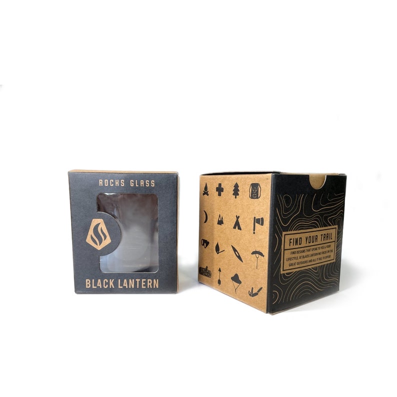 Mountain forest rocks glasses displayed on wood table