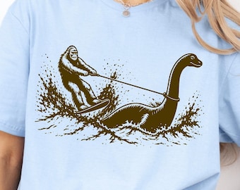 Bigfoot Water Skiing PNG, Nessie Cryptid Humor, Vintage Sasquatch Lake Monster Design, Funny Camping Graphic, Retro POD