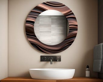 May include: A round, bronze-colored mirror with a wavy, textured frame hangs above a white, oval sink. The mirror is mounted on a beige wall, and the sink sits on a wooden countertop. A black faucet and soap dispenser are also visible.