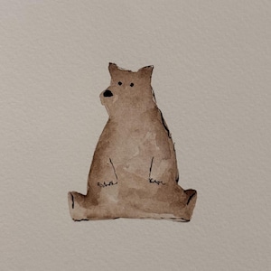 May include: Watercolor painting of a brown bear sitting upright. The bear has a simple design with black details for the eyes, nose, and claws. The artwork is on a white background.
