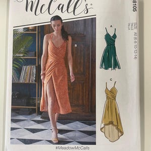 May include: McCall's sewing pattern M8105 showing a woman in an orange dress with a high slit. The pattern includes multiple view options. The text "#MeadowMcCalls" is visible.