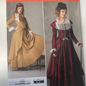 Może przedstawiać: Wzór szycia Simplicity 2172 przedstawiający dwie suknie w stylu wiktoriańskim. Wzór zawiera rozmiary HH 6, 8, 10 i 12. Suknie są w kolorach złotym i bordowym, ze plisowanymi spódnicami i szczegółowymi gorsetami. Marka wzoru to Simplicity.