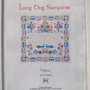 May include: A cross-stitch sampler kit titled "Virtue" by Long Dog Samplers. The design features floral and geometric patterns in various colors, with text that reads "Virtue's the chiefest Beauty of the mind." The kit includes 282 x 275 stitches.