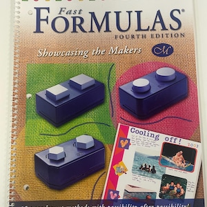 May include: A spiral-bound instructional book titled Fast Formulas Fourth Edition Showcasing the Makers. The cover features images of dark blue rectangular tools with two light grey square or hexagonal buttons and a page titled Cooling off! 2003.