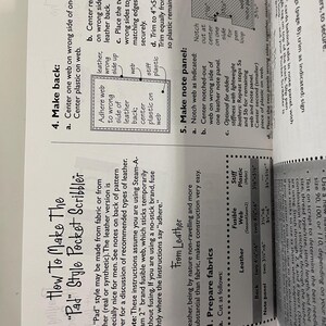 May include: A printed instructional guide titled How To Make The Pad Style Pocket Scribbler. The document features black text on a white background, including diagrams, step-by-step assembly instructions, and a table listing material sizes in inches.