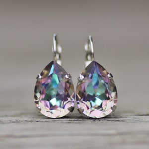 Pear shaped Mother Of Pearl Drop Earrings With Etched Design & 925 Ste
