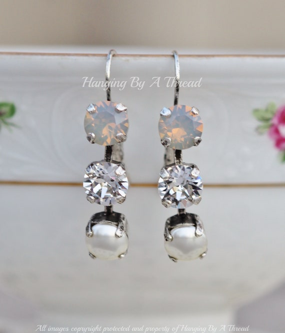 Orecchini con tre pietre placcate in argento creati con cristalli Zircondia® : Philip Jones