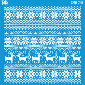 May include: A blue stencil featuring a white Nordic design. The pattern includes snowflakes, geometric shapes, and reindeer. The brand name "Paku" is in the upper left corner, and "SKU# 229" is in the upper right corner.