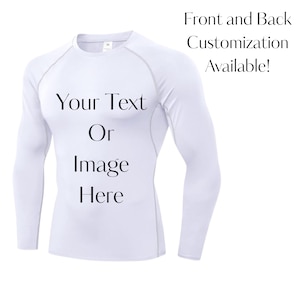 May include: White long-sleeve compression shirt with gray stitching. The shirt has the text "Your Text Or Image Here" on the front. The text "Front and Back Customization Available!" is also visible.
