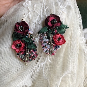 Red chandelier earrings flowers beat it and crystals