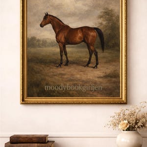 May include: A framed painting of a brown horse in a field. The horse is in profile, facing left, with a dark mane and tail. The artwork is in a gold frame and is displayed above a wooden table.