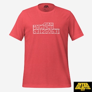 May include: A red t-shirt with white text that reads "MAGINOT 531250631". The shirt has short sleeves and a crew neck. The Inter Galactic Fit logo is in the bottom right corner.