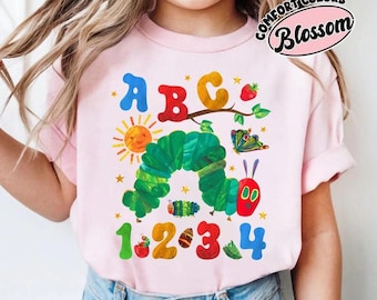 Camiseta con la transformación de la oruga hambrienta, "Todavía leo libros infantiles", "Personaje de dibujos animados", "La oruga muy hambrienta"