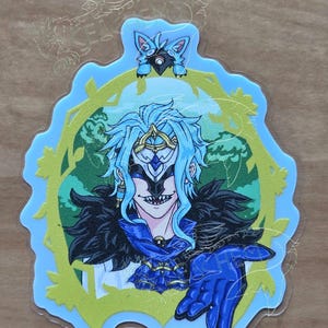 May include: A die-cut acrylic charm featuring an anime-style character with light blue hair, a dark mask, and a black feathered collar, framed by a green vine border. The charm measures approximately 1.97 inches wide by 2.5 inches tall.