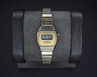 Reloj digital vintage QUINTEL de cuarzo dorado unisex con batería nueva
