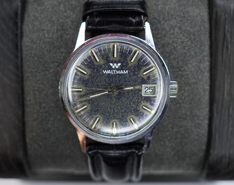 Reloj de pulsera Waltham vintage de 1970, 34 mm, 17 rubíes, esfera negra, cuerda manual, para hombre, funciona.