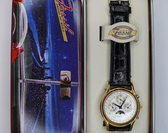 Reloj Fossil vintage de oro de 1995 para hombre, con triple fecha y luna, caja y documentación originales.