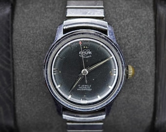 Reloj Enicar Ultrasonic vintage de 17 joyas Incabloc, de cuerda manual, suizo, con esfera negra.