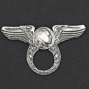 May include: Silver ring with a 1937 Buffalo nickel coin design and wings on either side. The ring is open and can be used as a key chain or a bottle opener.