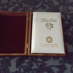 The Holy Bible in cherry wood box New American Bible. Here are the Old and New Testaments. NAB White Excellent  New old stock. Gift idea