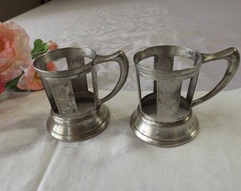 Antique 2 pewter glass-holders with no dents. Marked  : CASILWARE .Gift
