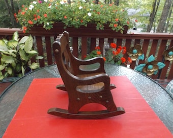 Antique Wooden doll rocking chair in mint condition. doll house, photo shoot, nursery decor or decoration. Gift idea