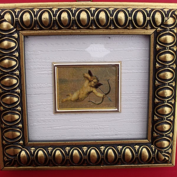 23 Kt. Gold. Italian Art Nouveau miniature on gold.23 Kt. Gold Leaf (leaf pure gold).Cherub with bow and arrow.Vintage miniature. Italy.