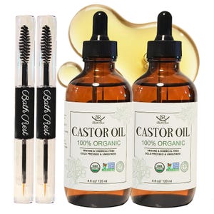 May include: An image features two bottles of castor oil and two eyebrow brushes. The castor oil bottles are amber-colored with black droppers and white labels. The labels read "Castor Oil 100% Organic". The eyebrow brushes have black handles and clear tubes with the text "Bath Rest".