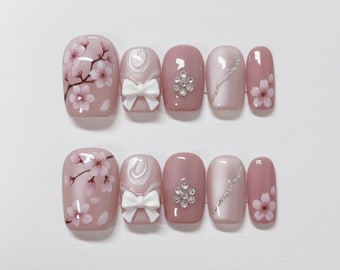 Kirschblüten Press-On Nail Art, Rosa Blumen-Design mit Schleifen, Elegantes Nagelset, Handbemalte Blumennägel, Frühlings Nail Art