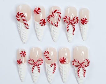 Festive Long Almond Press-On Nails: White Sweater Print French Tips with Candy Cane Design – Perfect Holiday Gift for Her this Christmas