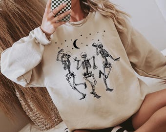 Dancing Skeleton Halloween Sweatshirt: Spooky Party Tee
