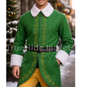 May include: A green coat with white fur trim on the collar and cuffs. The coat has a black belt and gold embroidered detailing. The text "True Hide Jackets" is visible on the coat.