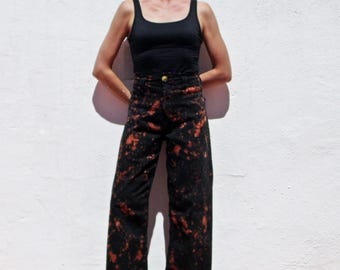 Unieke wijde jeans met abstracte print in zwarte acid wash