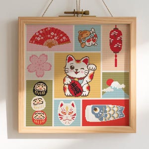 May include: A white ceramic mug with a black handle and the text "But First, Coffee" in a bold, black font. The mug is set against a blurred background, suggesting a cozy setting.