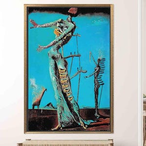 May include: A framed surrealist painting with a gold frame. The artwork features a tall, elongated figure with outstretched arms against a bright blue sky. Other figures and a giraffe are also depicted. The painting has a dreamlike quality.